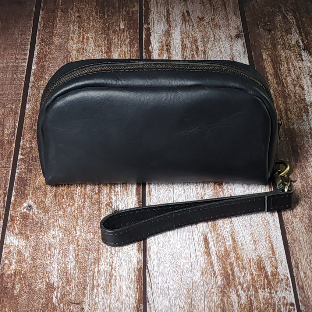 Sesa Verto El Çantası – Deri, Tek Bölmeli, Bilek Askılı, Şık ve Dayanıklı Erkek Aksesuarı