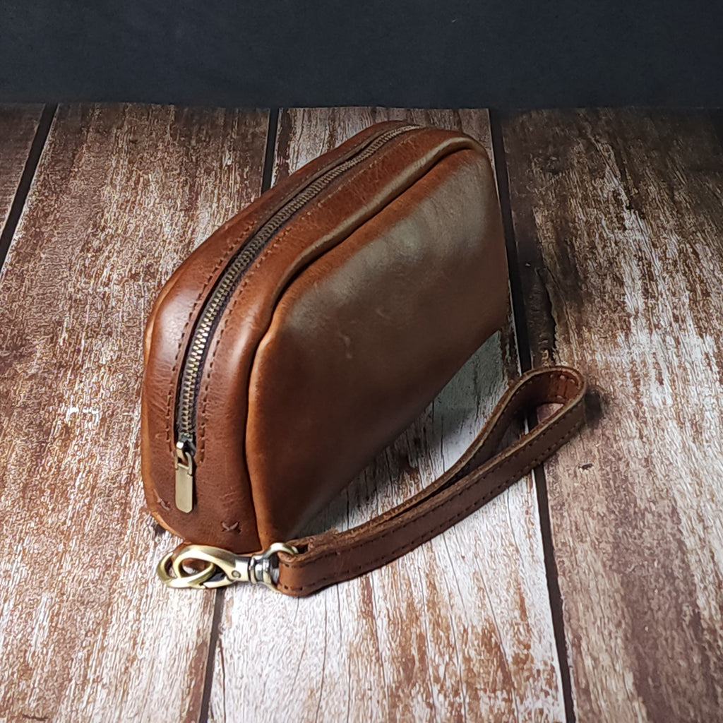 Sesa Verto El Çantası – Deri, Tek Bölmeli, Bilek Askılı, Şık ve Dayanıklı Erkek Aksesuarı